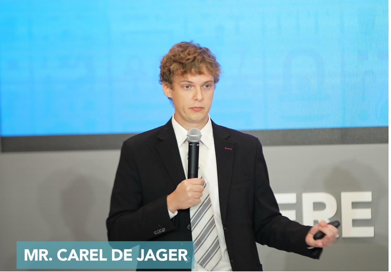 Carel de Jager speaking on stage at the World Youth Forum in Egypt, 2019